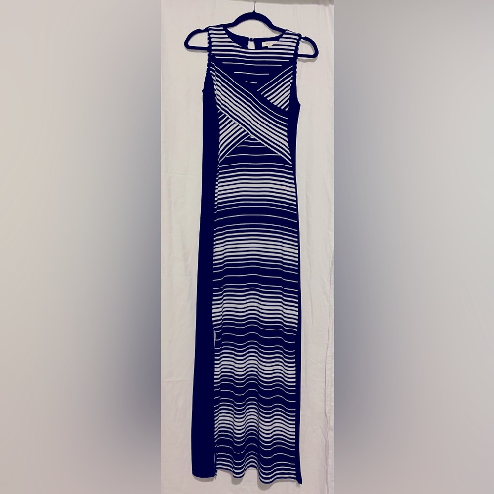 Long maxi stretch dress.  Classy and sexy on, hugs curves.